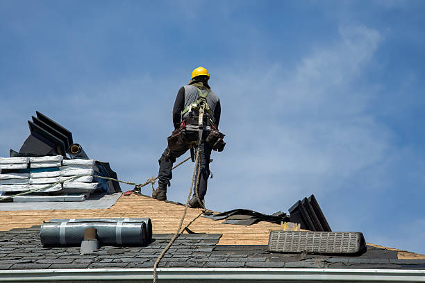 Professional Roofing technician working in Greene, RI